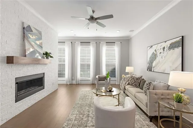 a living room with furniture and a fireplace