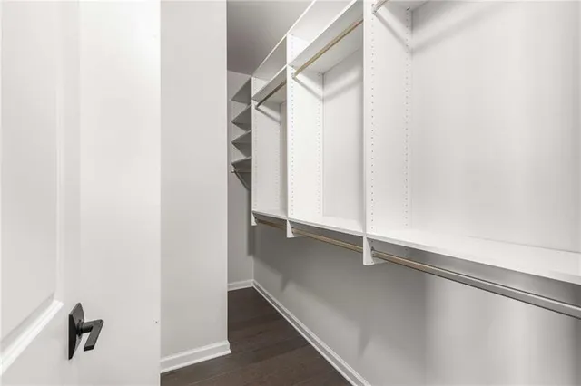 a view of an empty walk in closet