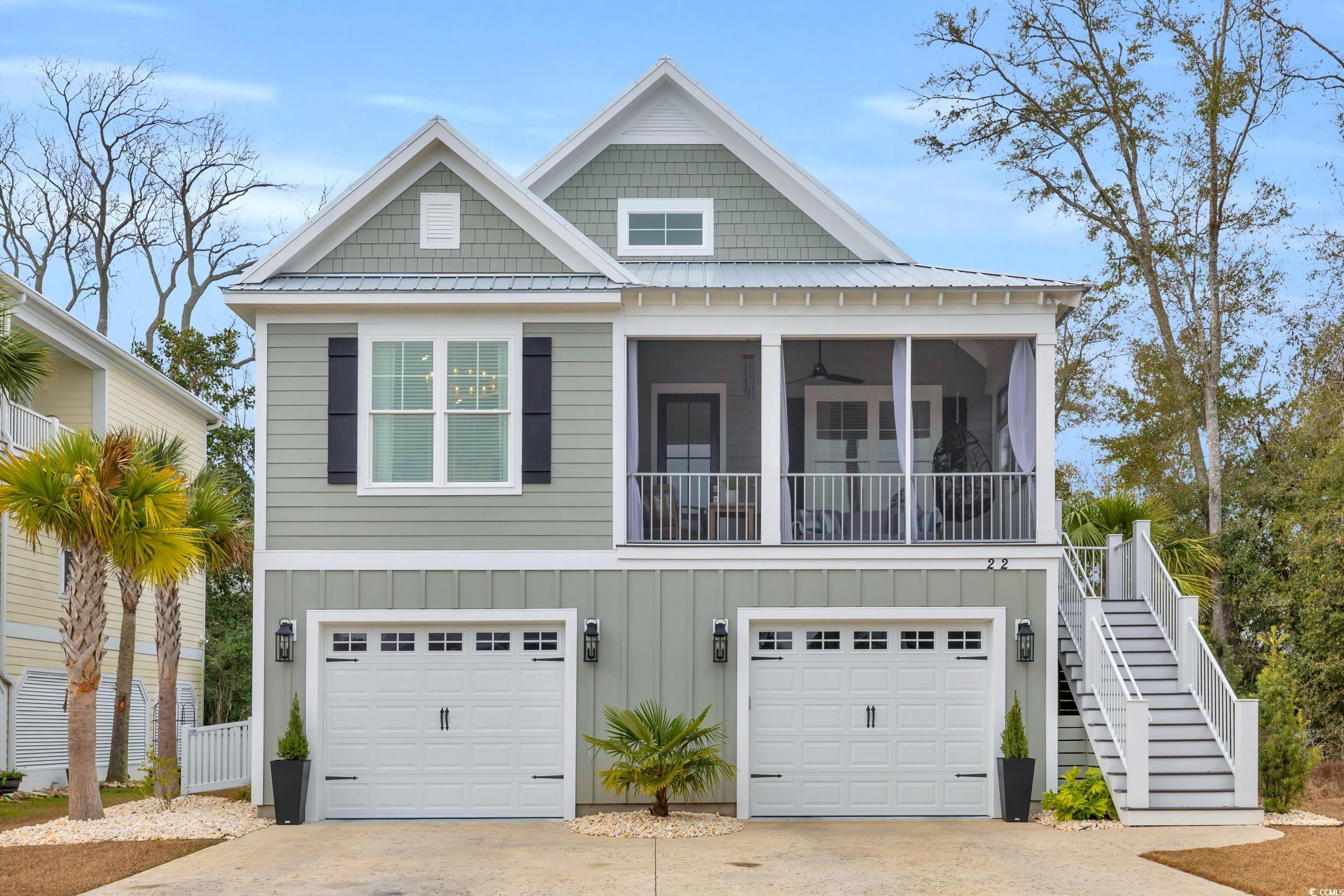 22 Trigger Fish Lane Murrells Inlet, SC 29576 - Photo 1 of 39 View of front of property featuring a sunroom and