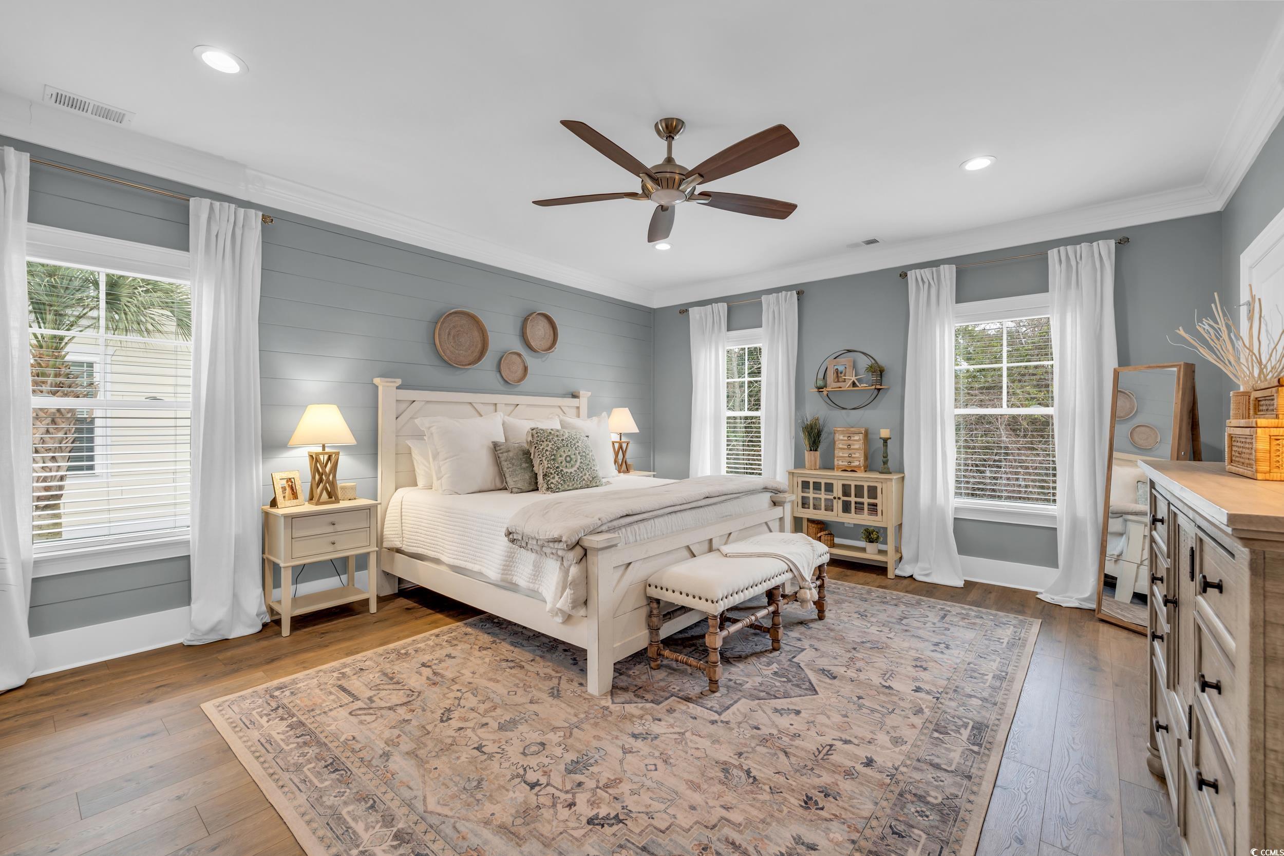 22 Trigger Fish Lane Murrells Inlet, SC 29576 - Photo 15 of 39 Bedroom with ceiling fan, crown molding, and wood-