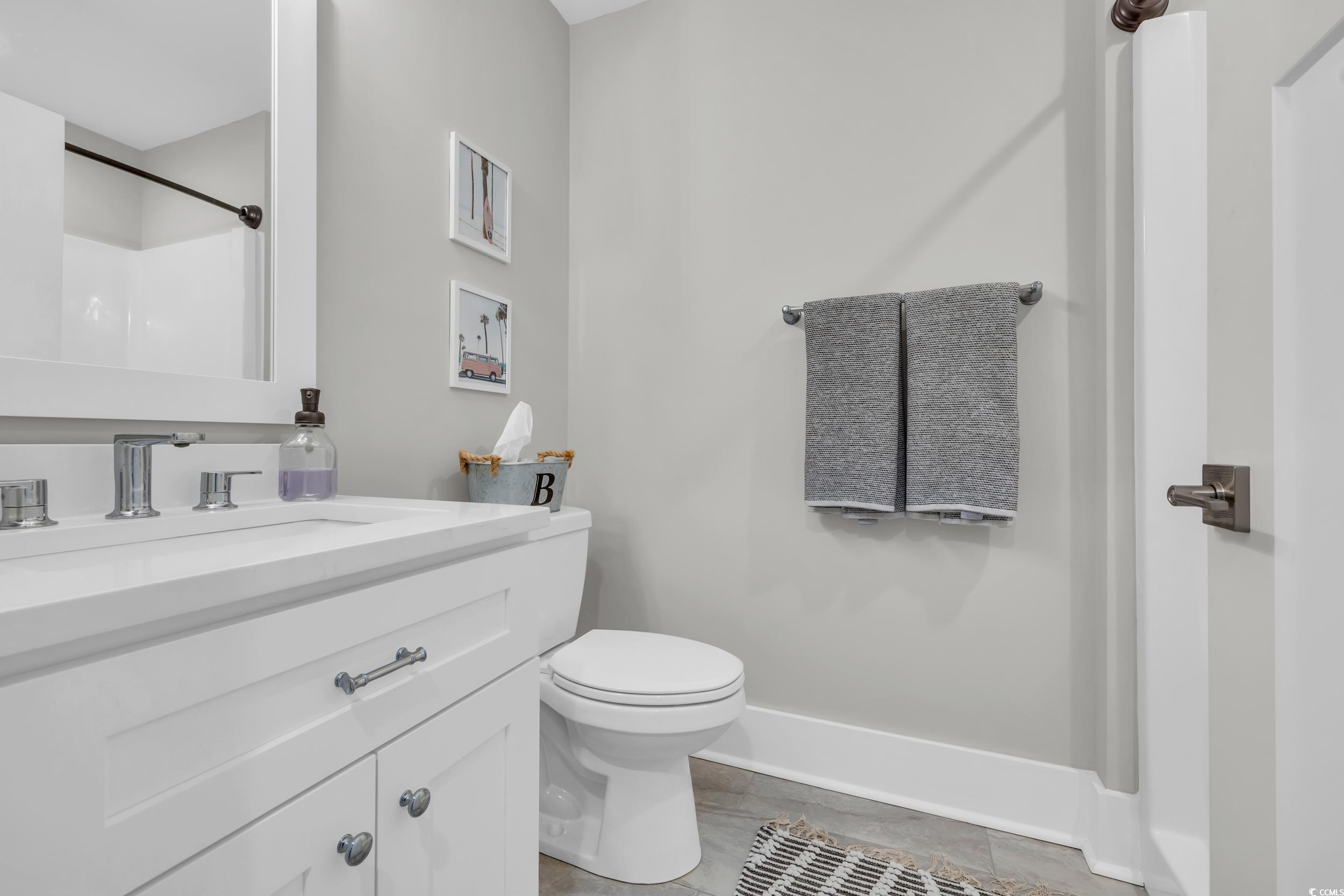 22 Trigger Fish Lane Murrells Inlet, SC 29576 - Photo 25 of 39 Bathroom with tile patterned floors, vanity, toile