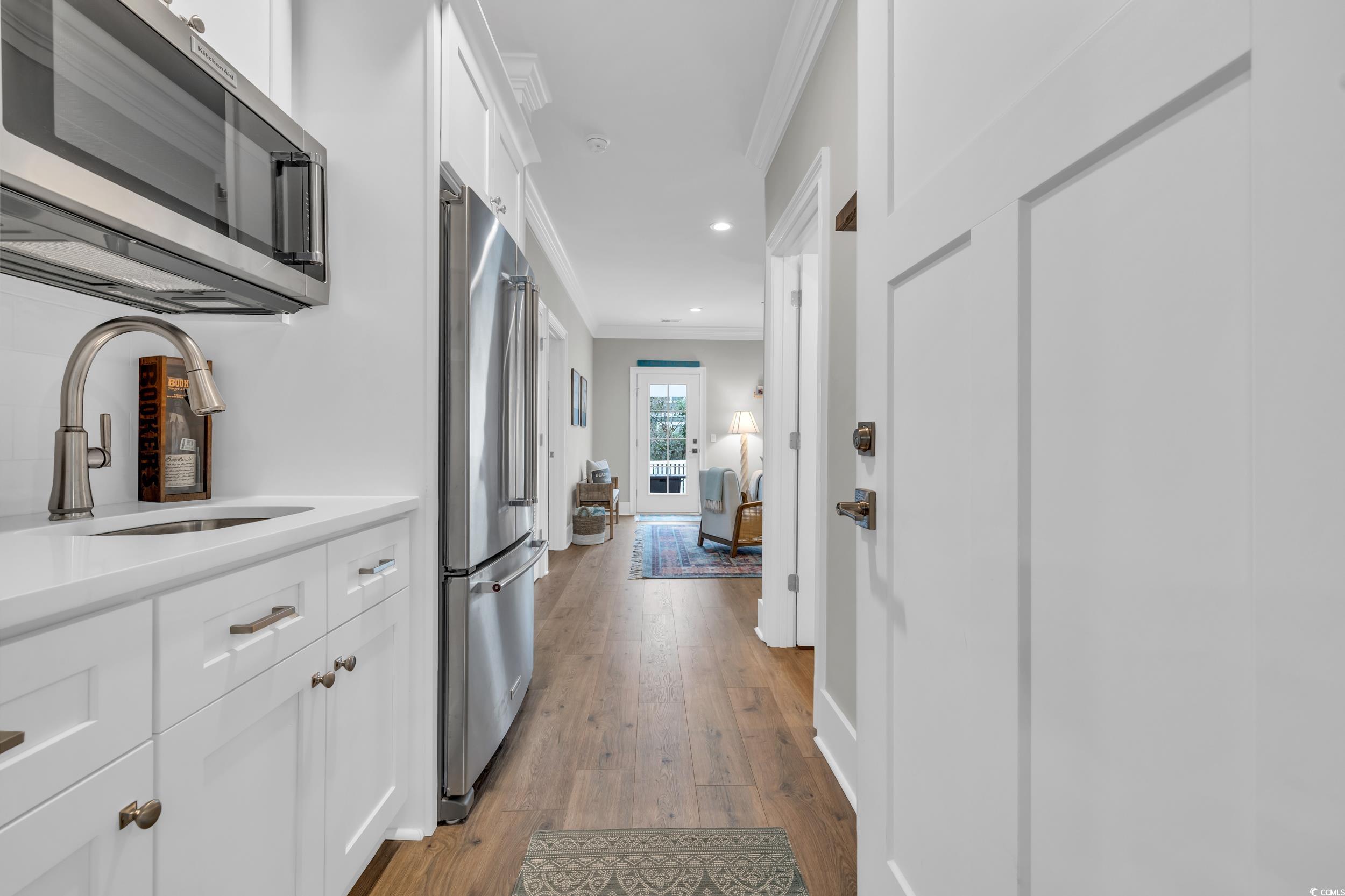 22 Trigger Fish Lane Murrells Inlet, SC 29576 - Photo 28 of 39 Hall with light hardwood / wood-style floors, crow