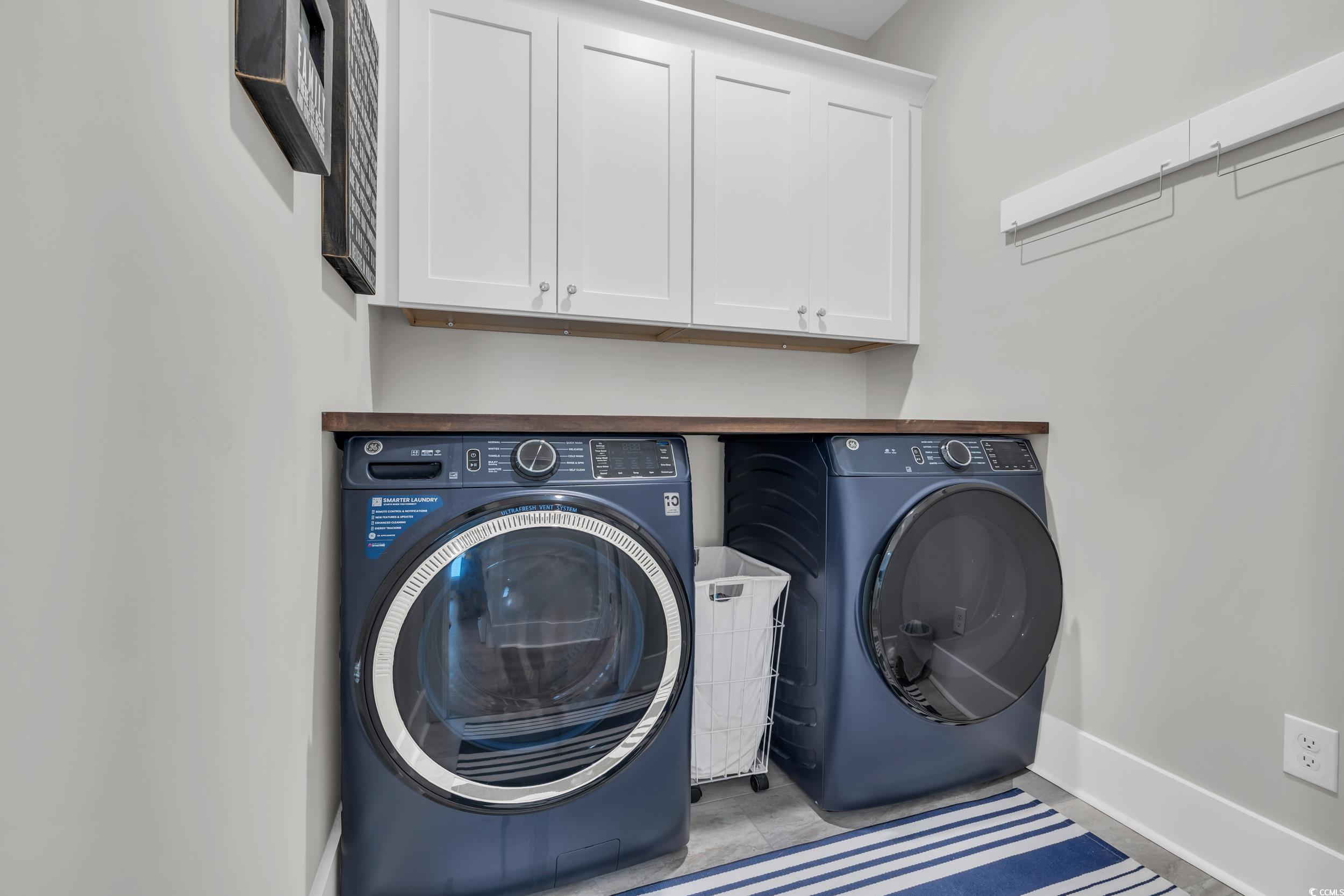 22 Trigger Fish Lane Murrells Inlet, SC 29576 - Photo 33 of 39 Laundry room featuring washer and clothes dryer an
