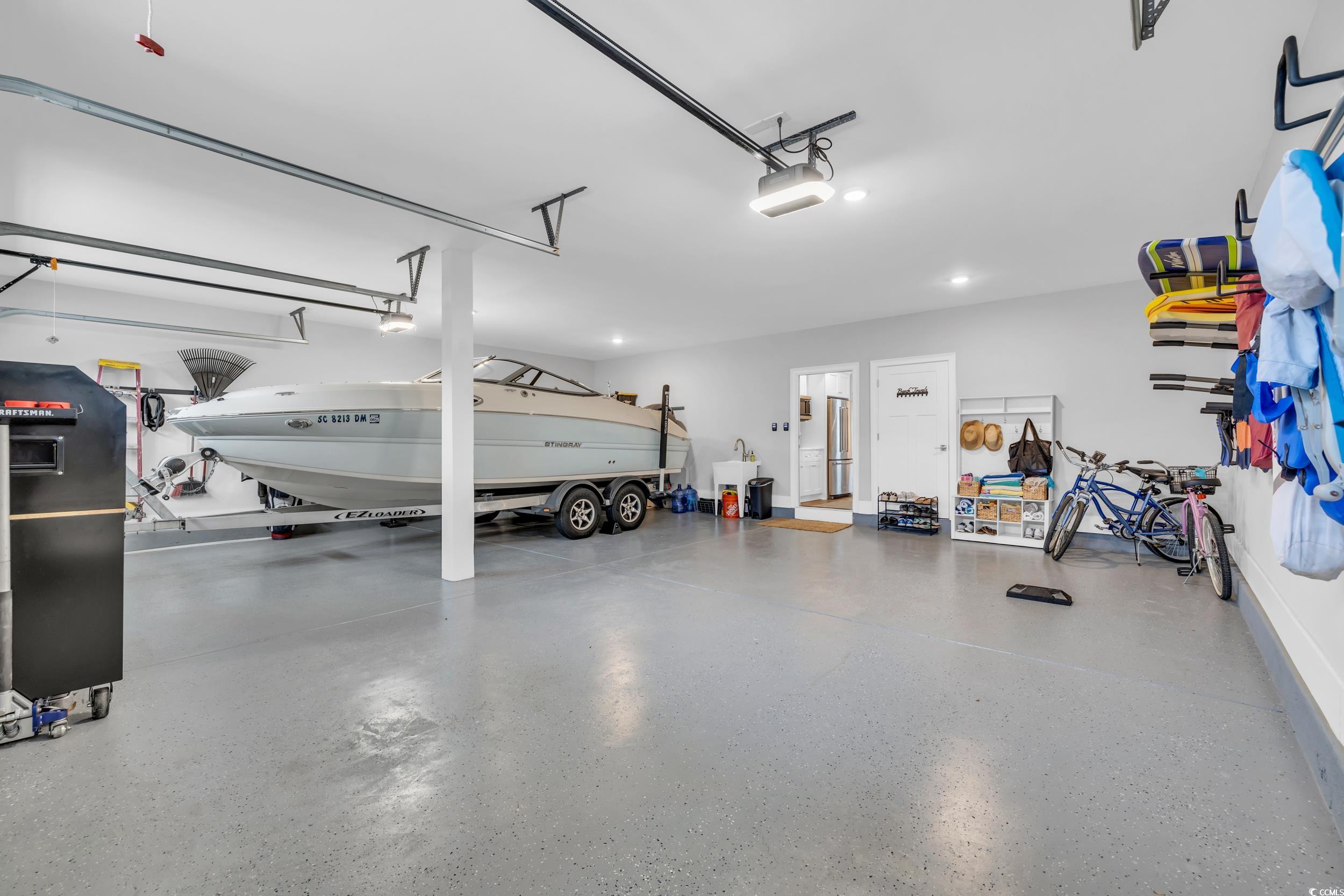 22 Trigger Fish Lane Murrells Inlet, SC 29576 - Photo 36 of 39 Garage with a garage door opener