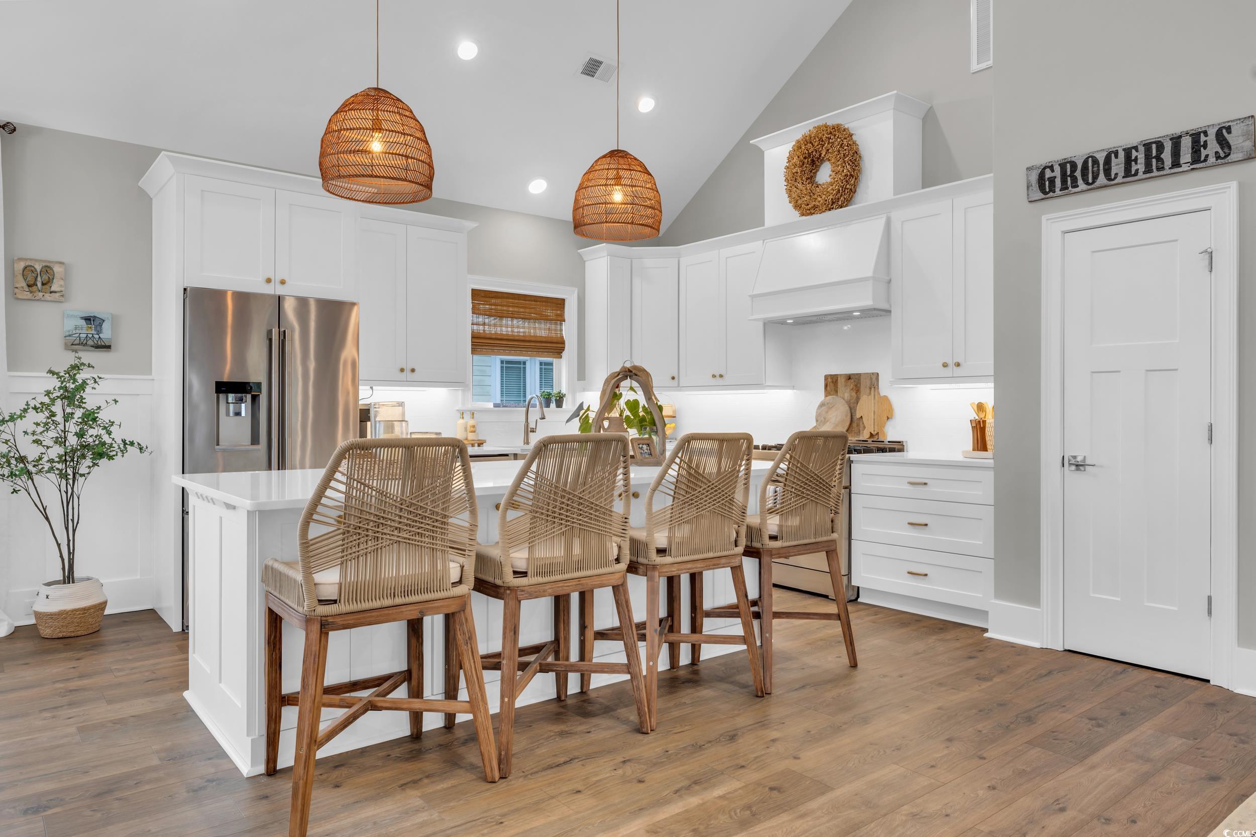 22 Trigger Fish Lane Murrells Inlet, SC 29576 - Photo 9 of 39 Kitchen with high quality fridge, custom range hoo