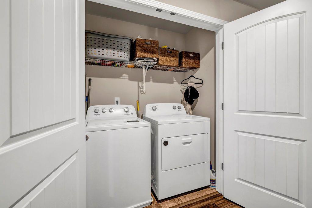 255 Skipjack Court Covington, GA 30016 - Photo 22 of 24 a utility room with dryer and washer