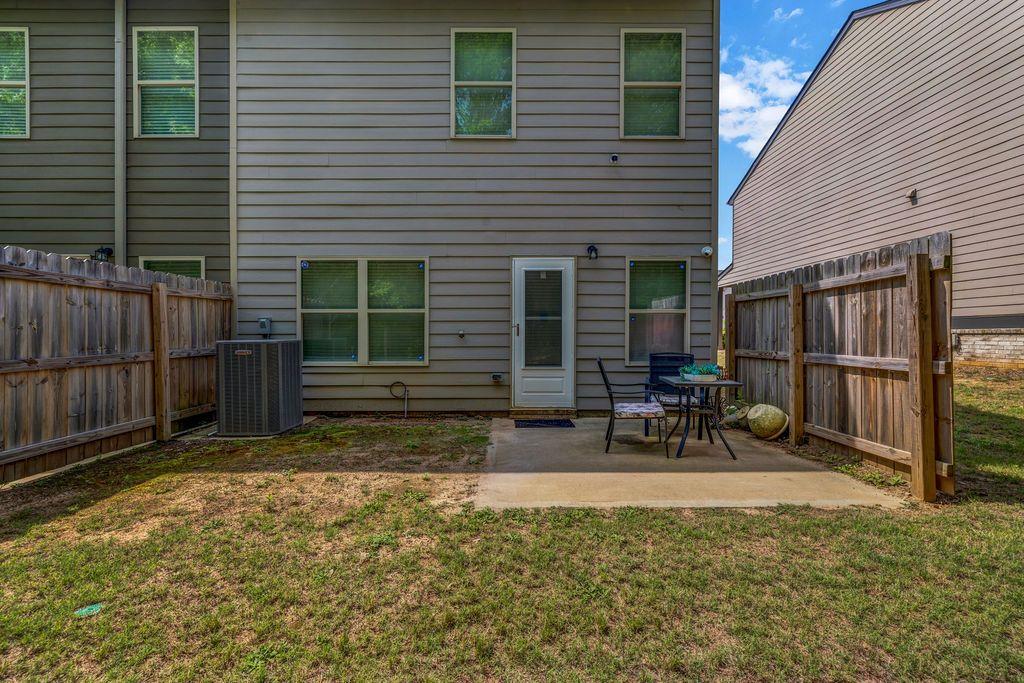 255 Skipjack Court Covington, GA 30016 - Photo 23 of 24 a view of two chairs in patio