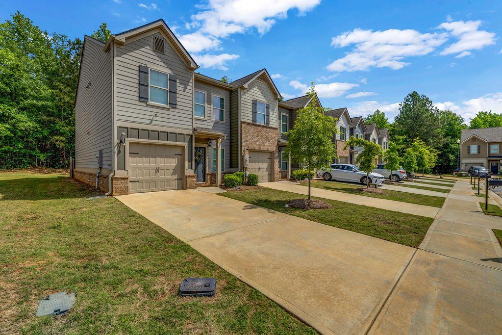 255 Skipjack Court Covington, GA 30016 - Photo 3 of 24 a view of a house with entertaining space