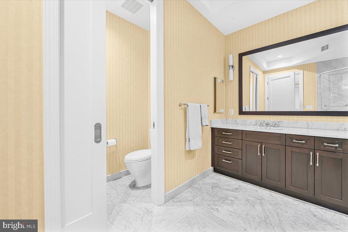 8111 River Road, Unit 131 Bethesda, MD 20817 - Photo 28 of 59 Owners' Bath w/dual vanities & commode room