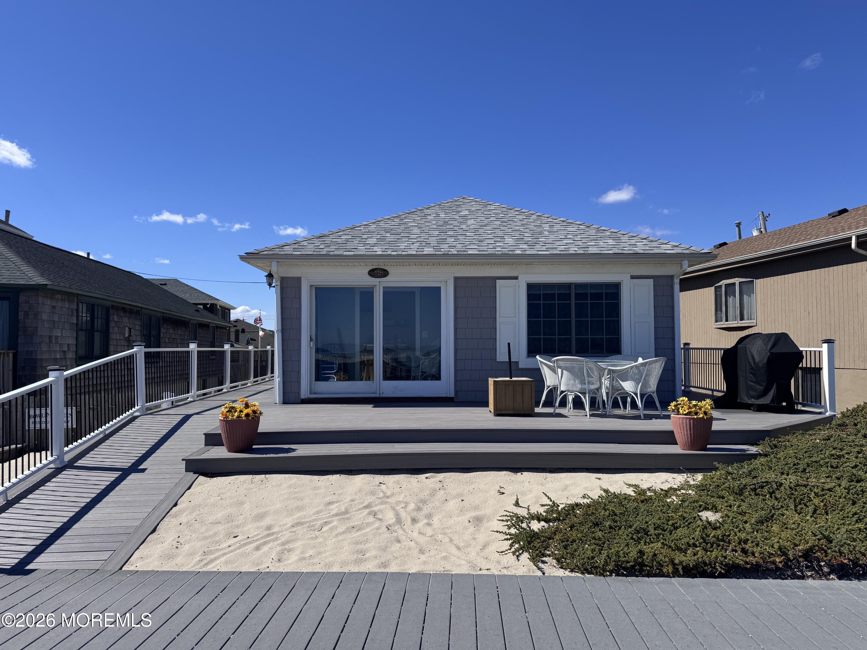 115 Boardwalk Point Pleasant Beach, NJ 08742 - Photo 3 of 23 a view of a house with backyard sitting area