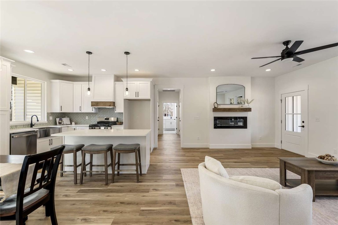 191 Murdock Road Belton, SC 29627 - Photo 24 of 24 An open floorplan seamlessly connects the kitchen and living areas, offering effortless daily living.