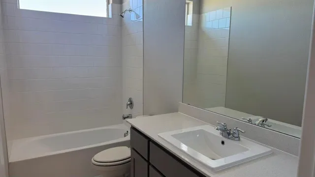 a bathroom with a shower and a bathtub