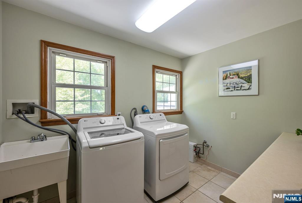 411 Snyder Road Wyckoff, NJ 07481 - Photo 29 of 36 a room with storage and utility