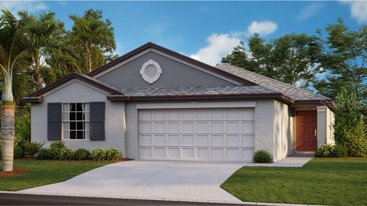 2751 Red Egret Drive Bartow, FL 33830 - Photo 1 of 1 a front view of a house with a garden