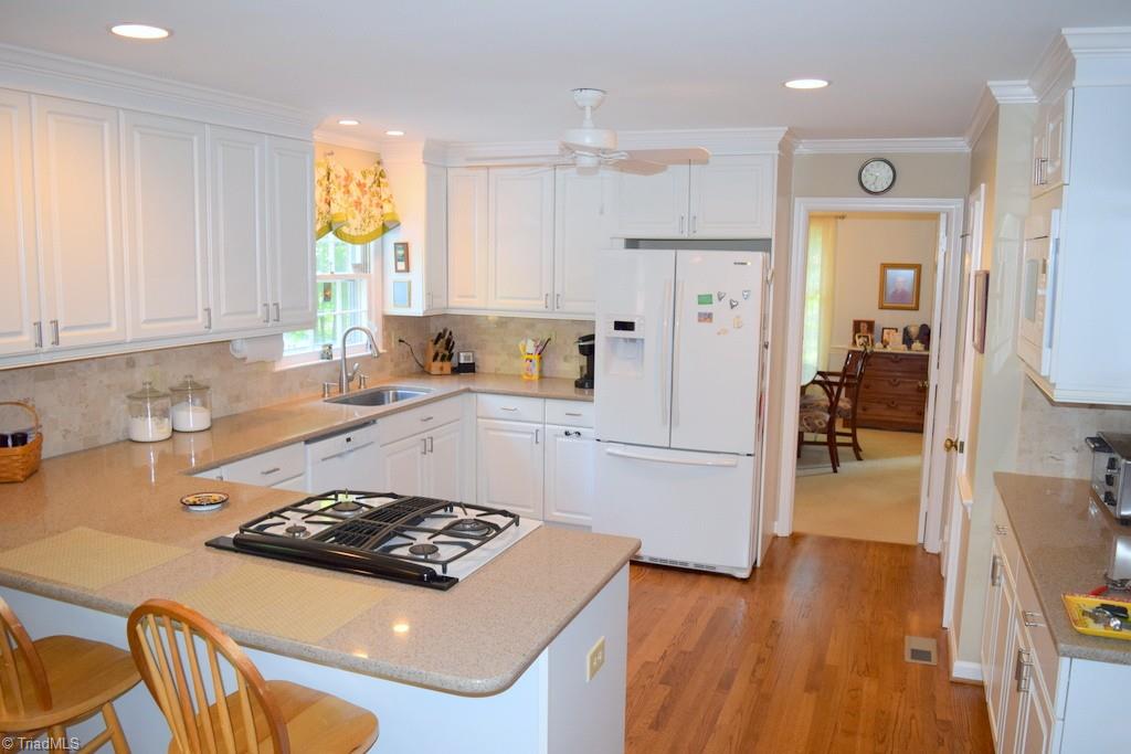 450 Archer Road Winston-Salem, NC 27106 - Photo 7 of 24 Bright and inviting updated Kitchen is spacious and functional