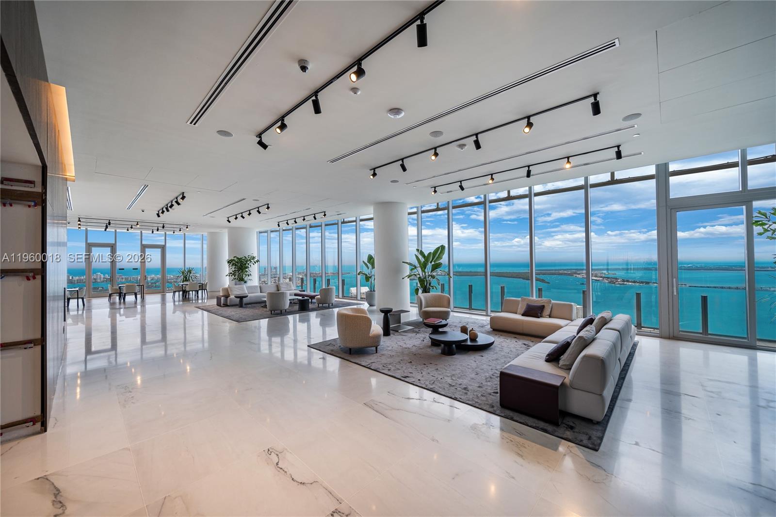 300 Biscayne Blvd Way, Unit 2009 Miami, FL 33131 - Photo 53 of 58 a living room with furniture and a large window