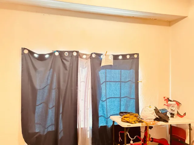 a view of balcony with furniture