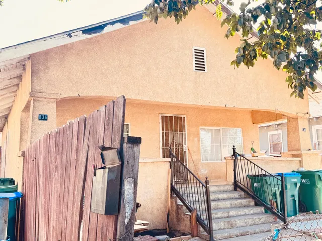 a view of balcony with furniture