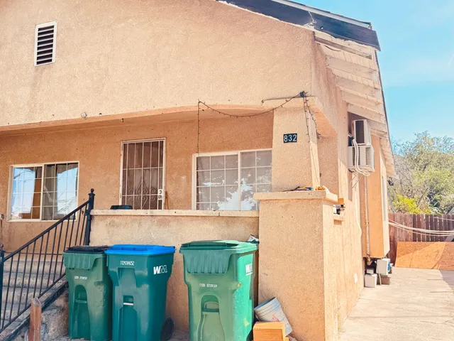 view of a house with a backyard