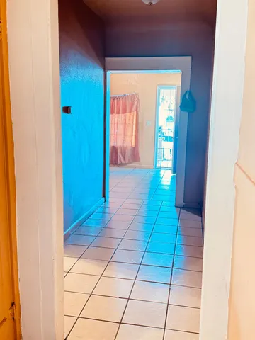 a view of entryway with a front door