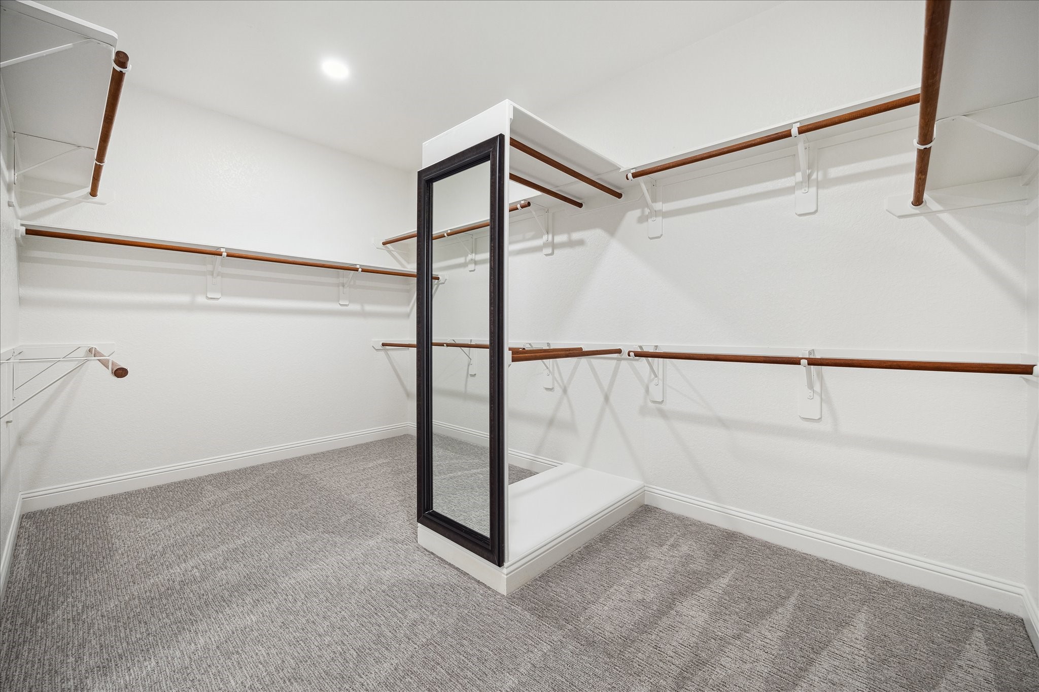 6211 Alameda Point Lane Houston, TX 77041 - Photo 23 of 50 Spacious walk-in closet featuring upper and lower hanging space, and generous storage throughout.
