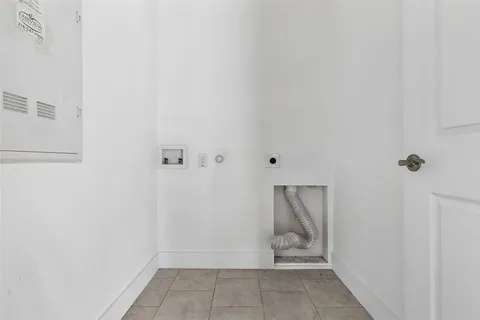 a bathroom with a granite countertop sink toilet a mirror and shower