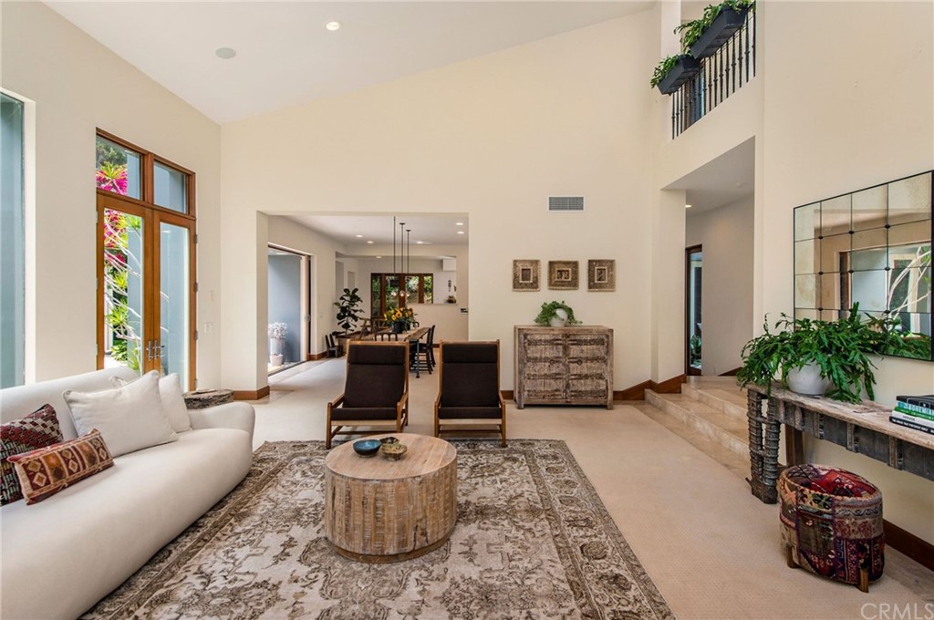 10 Smithcliffs Road Laguna Beach, CA 92651 - Photo 13 of 38 a living room with furniture a window and a flat screen tv