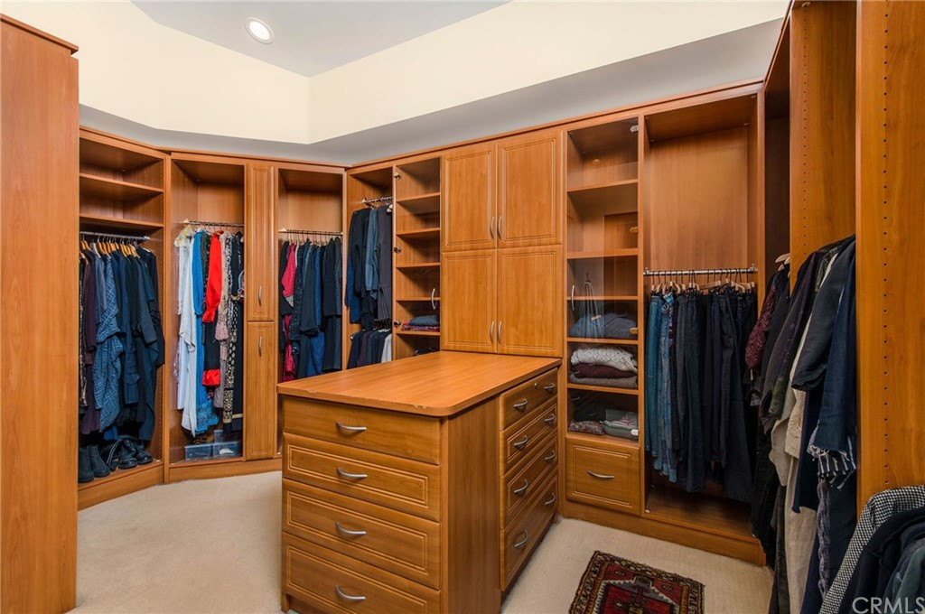10 Smithcliffs Road Laguna Beach, CA 92651 - Photo 26 of 38 a view of walk in closet with clothes