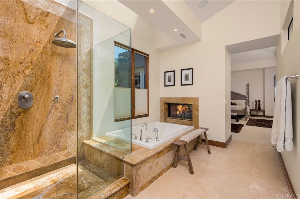 10 Smithcliffs Road Laguna Beach, CA 92651 - Photo 28 of 38 a spacious bathroom with a tub sink and shower