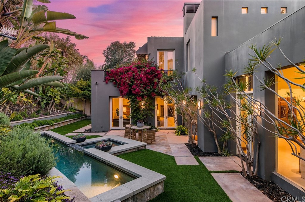 10 Smithcliffs Road Laguna Beach, CA 92651 - Photo 5 of 38 a view of a house with a sink and a yard