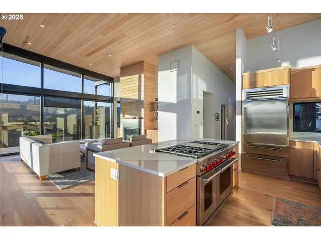 a kitchen that has a stove and a refrigerator
