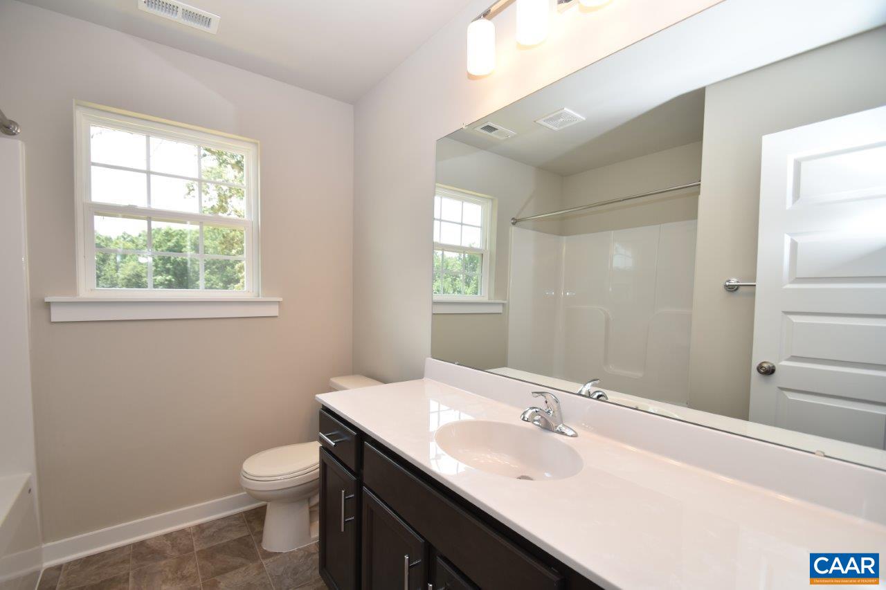 325 Gold Mine Road Palmyra, VA 22963 - Photo 20 of 28 a bathroom with a sink and a toilet