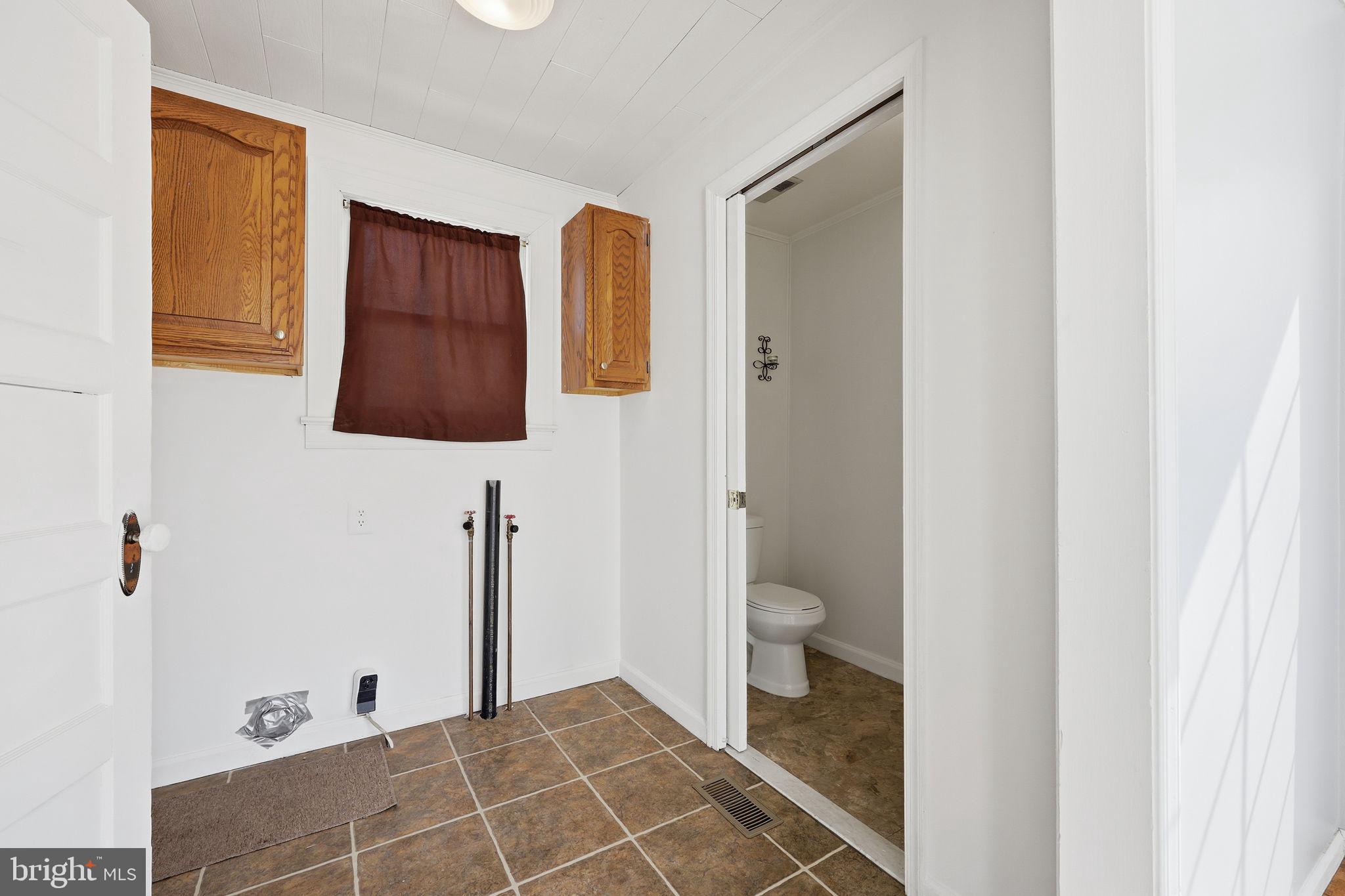 312 Pleasant Street West Hammonton, NJ 08037 - Photo 17 of 64 a bathroom with a granite countertop sink a toilet and shower