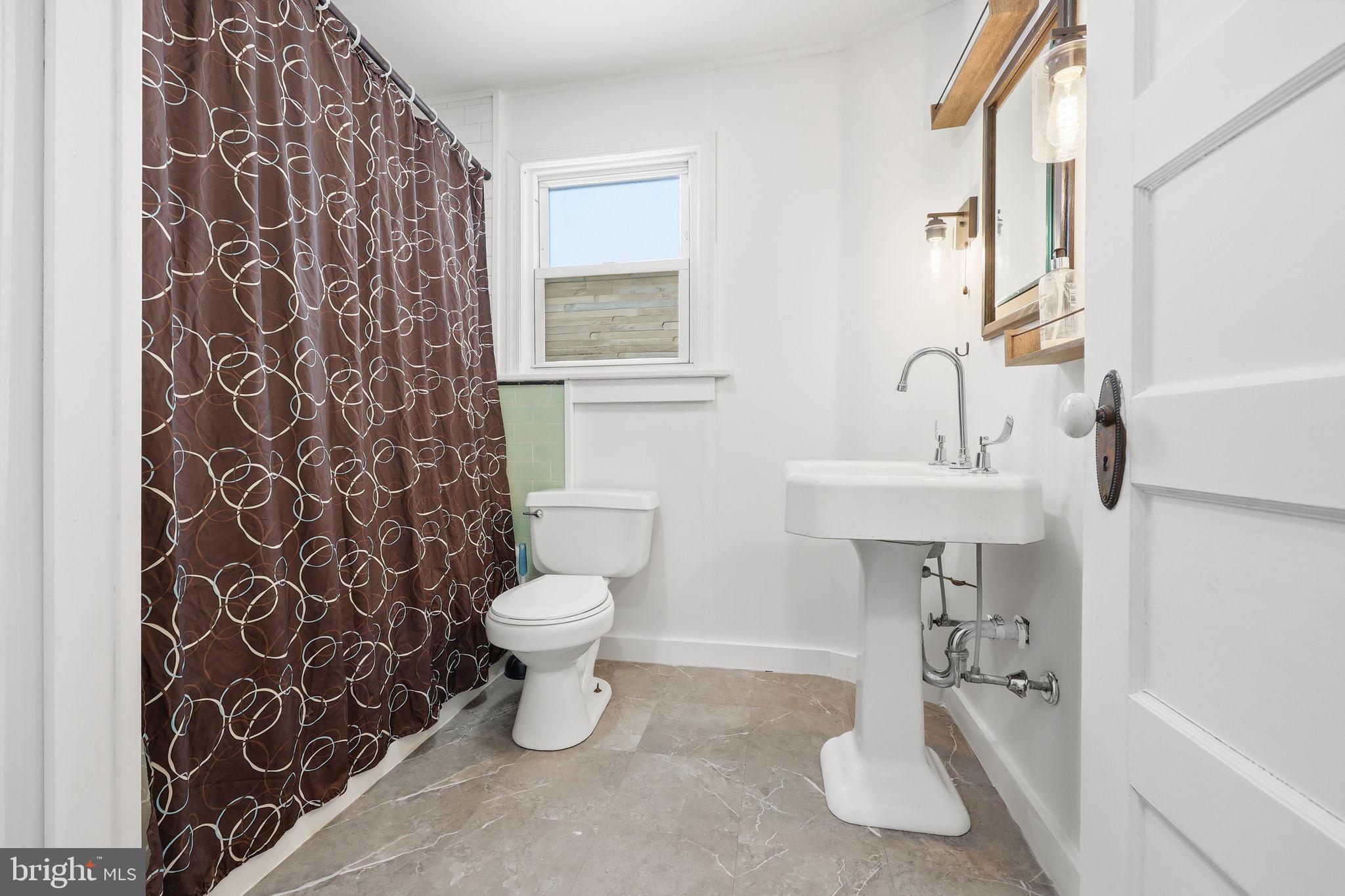 312 Pleasant Street West Hammonton, NJ 08037 - Photo 24 of 64 a bathroom with a sink toilet and shower