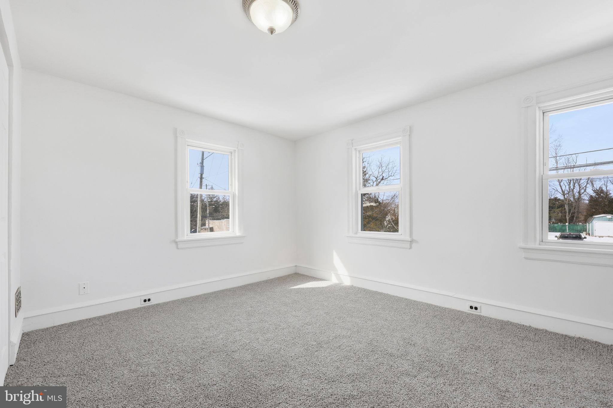 312 Pleasant Street West Hammonton, NJ 08037 - Photo 27 of 64 a view of an empty room with a window