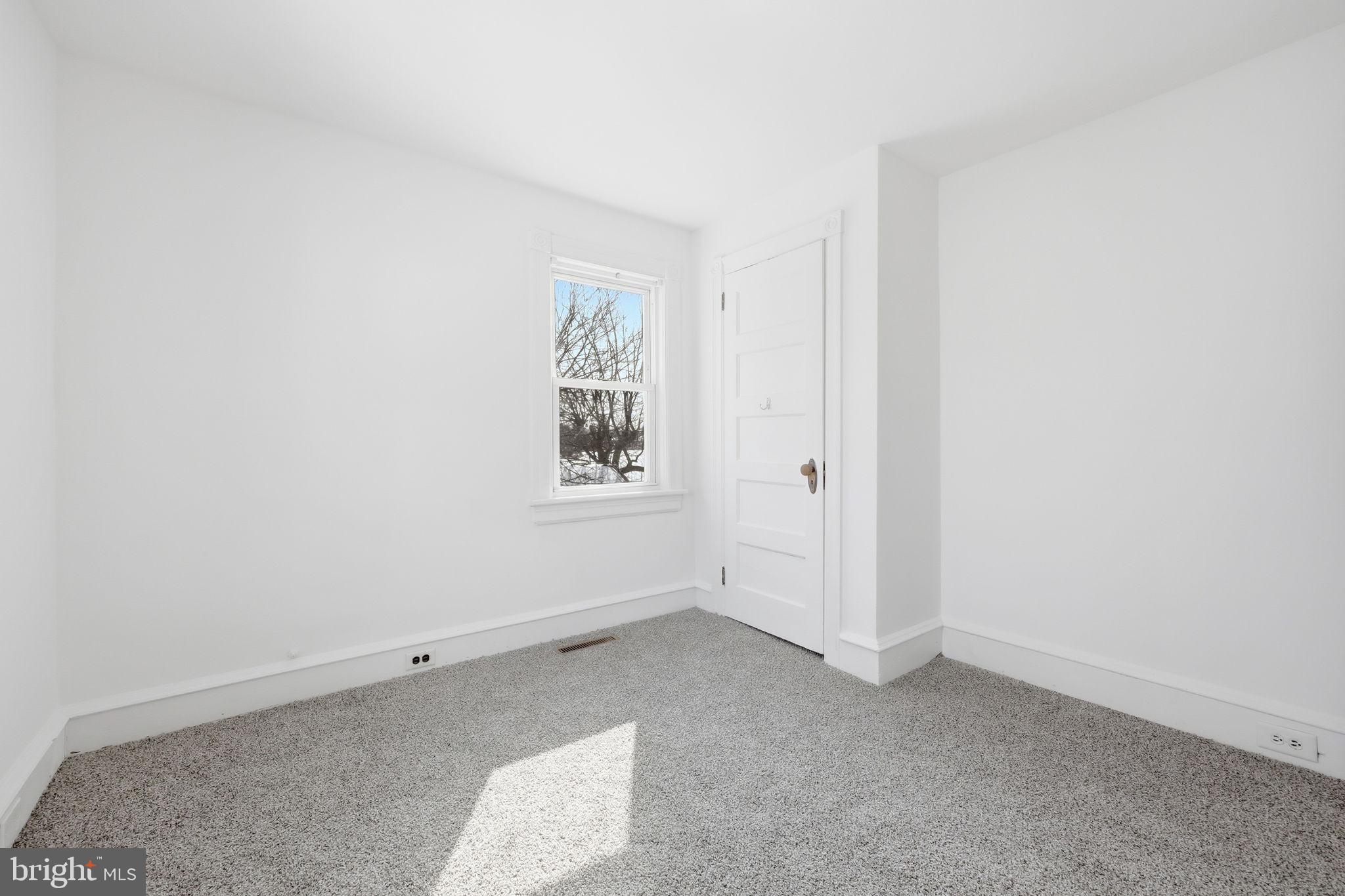 312 Pleasant Street West Hammonton, NJ 08037 - Photo 28 of 64 an empty room with windows