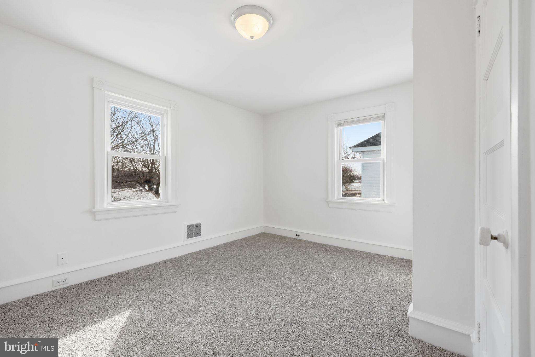 312 Pleasant Street West Hammonton, NJ 08037 - Photo 30 of 64 an empty room with windows and closet