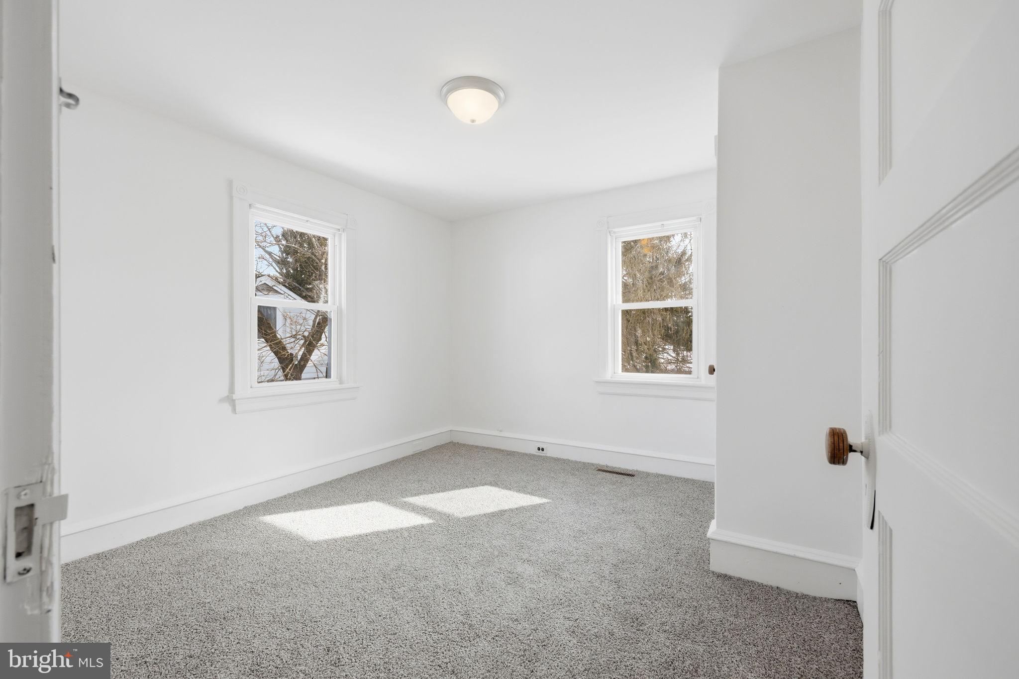 312 Pleasant Street West Hammonton, NJ 08037 - Photo 31 of 64 an empty room with windows