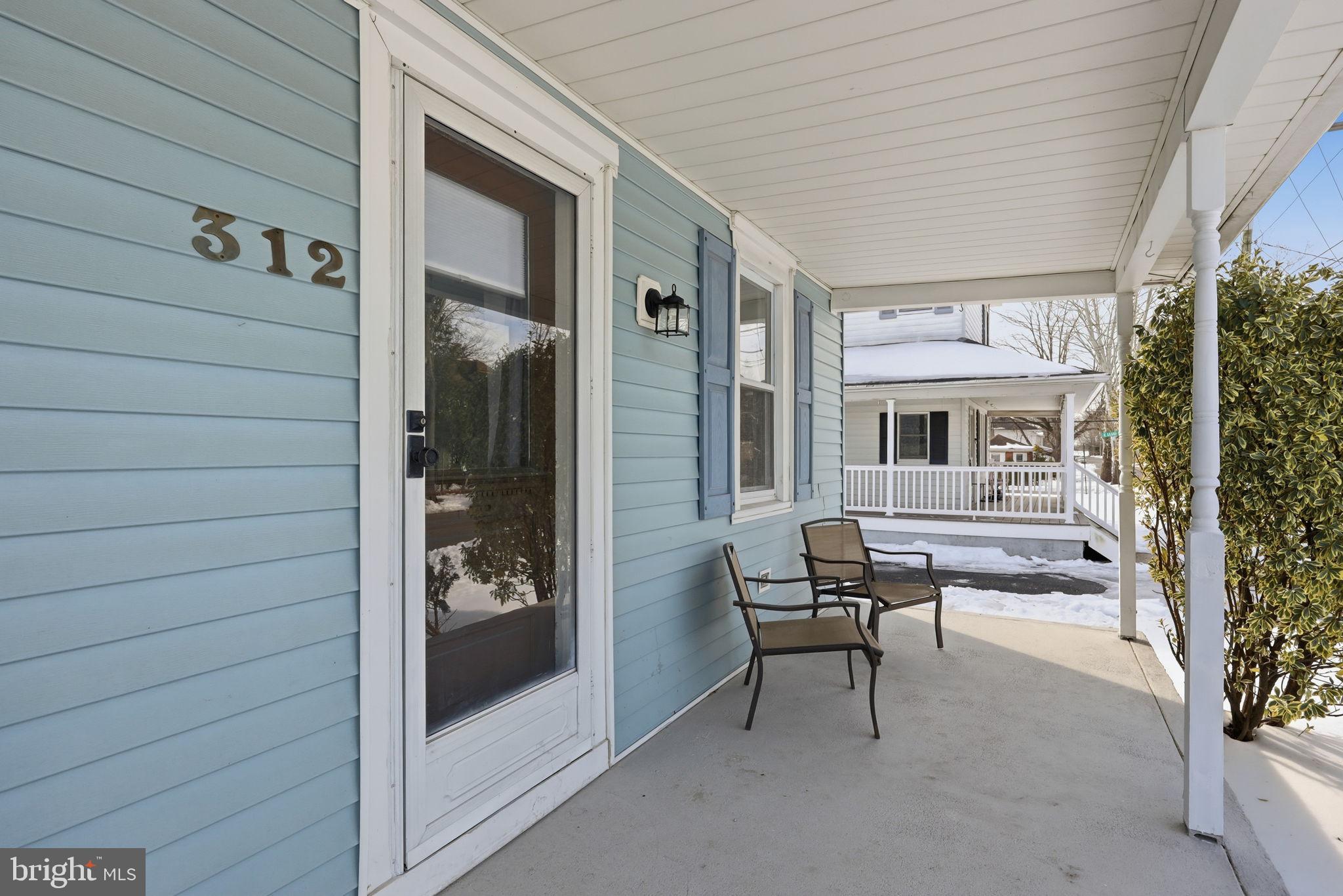 312 Pleasant Street West Hammonton, NJ 08037 - Photo 5 of 64 a porch with seating space