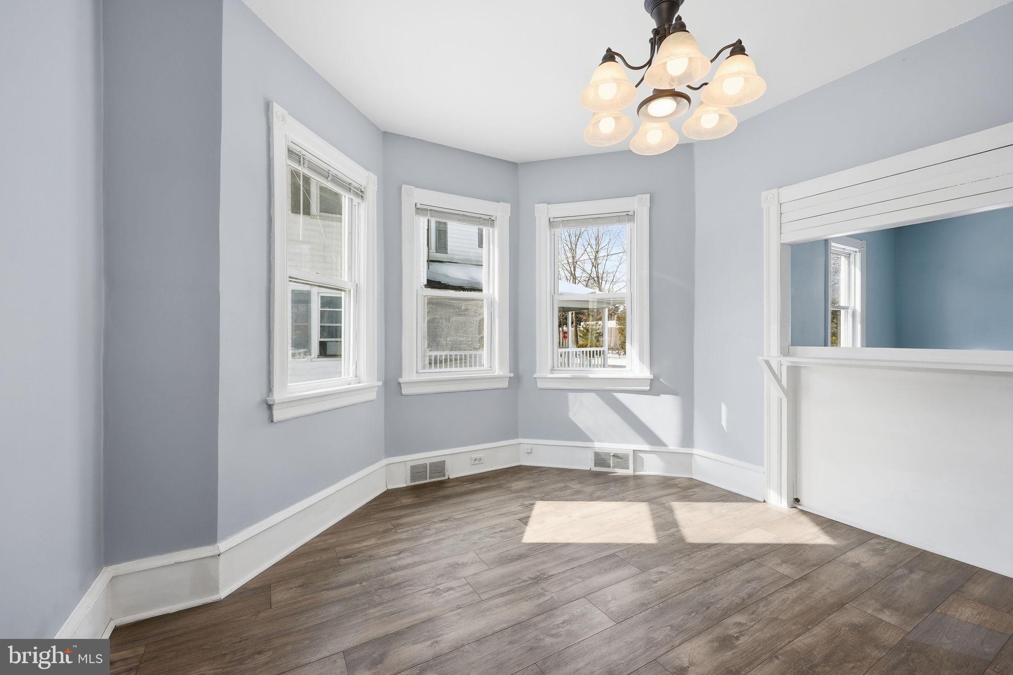 312 Pleasant Street West Hammonton, NJ 08037 - Photo 10 of 64 a view of empty room with wooden floor and fan