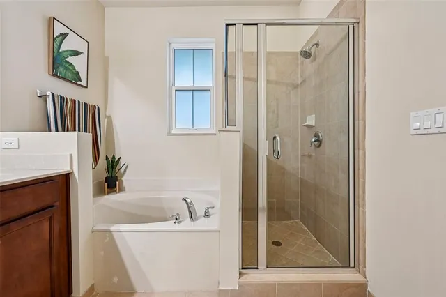 a bedroom with a bed and a cabinets