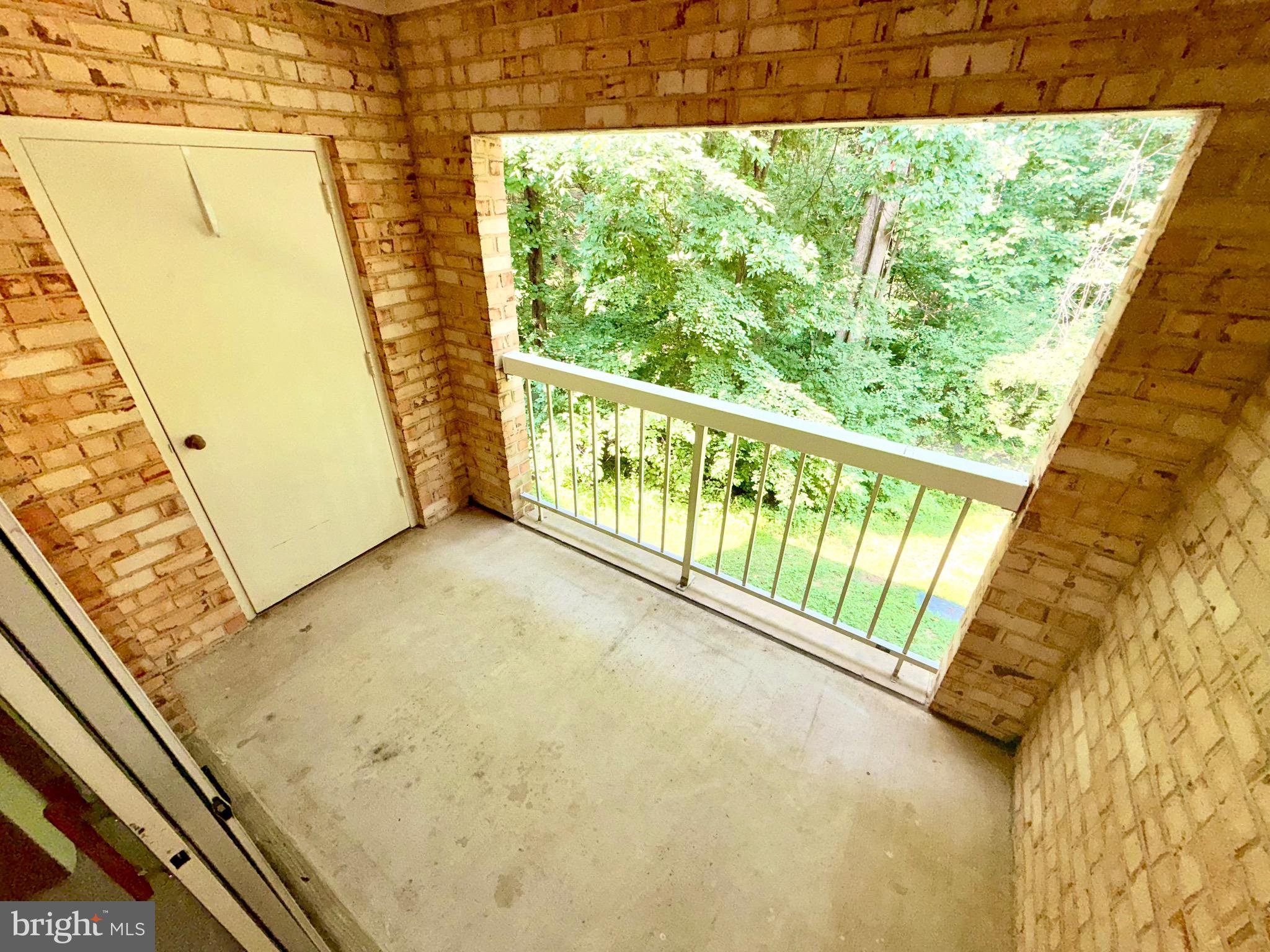 5918 Cove Landing Road, Unit 202 Burke, VA 22015 - Photo 12 of 26 Balcony with storage & HVAC door.