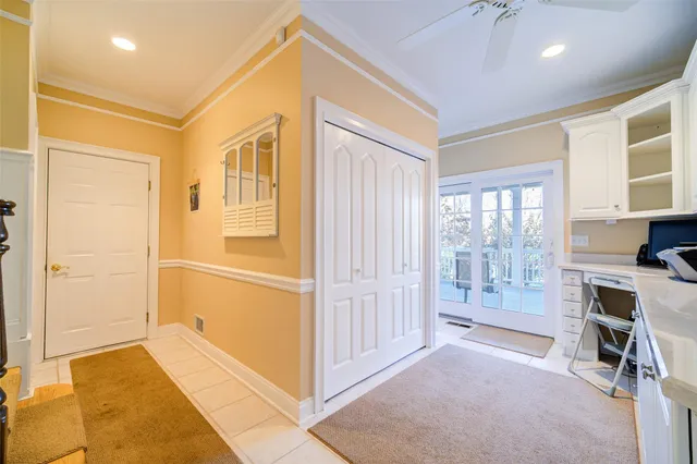 a view of livingroom with hardwood floor and a ceiling fan