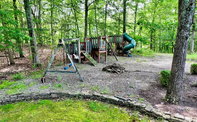 a view of a park with a slide