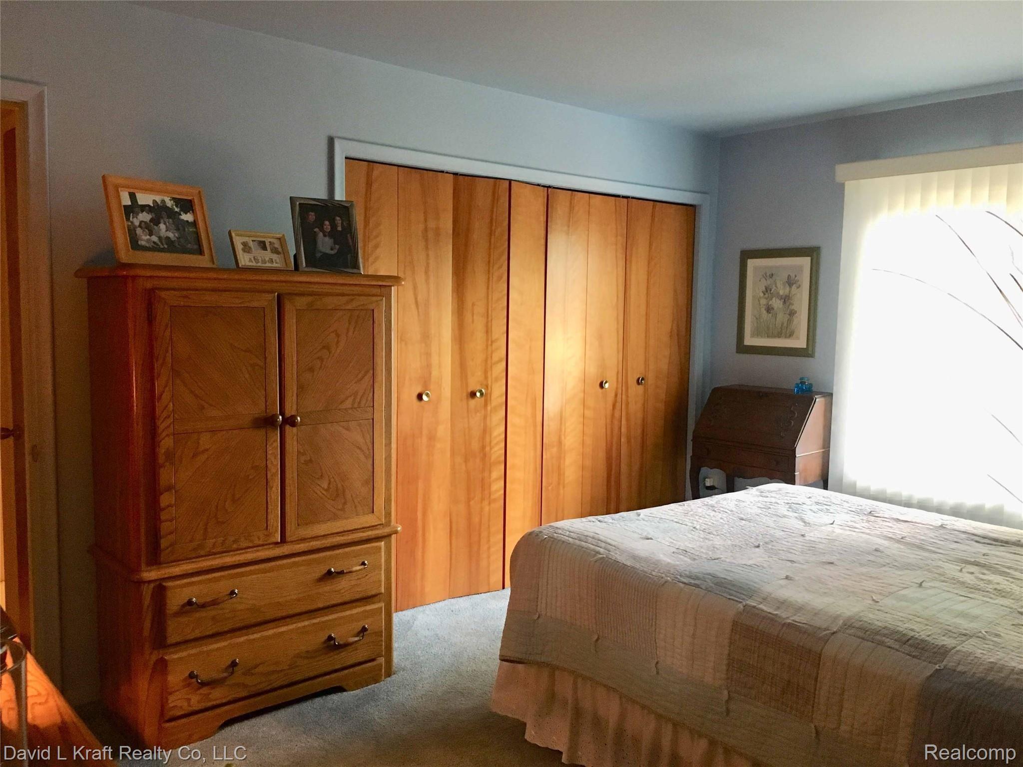 6268 West Kinde Road Caseville, MI 48725 - Photo 17 of 40 6268wKindeBed1Closets.jpg