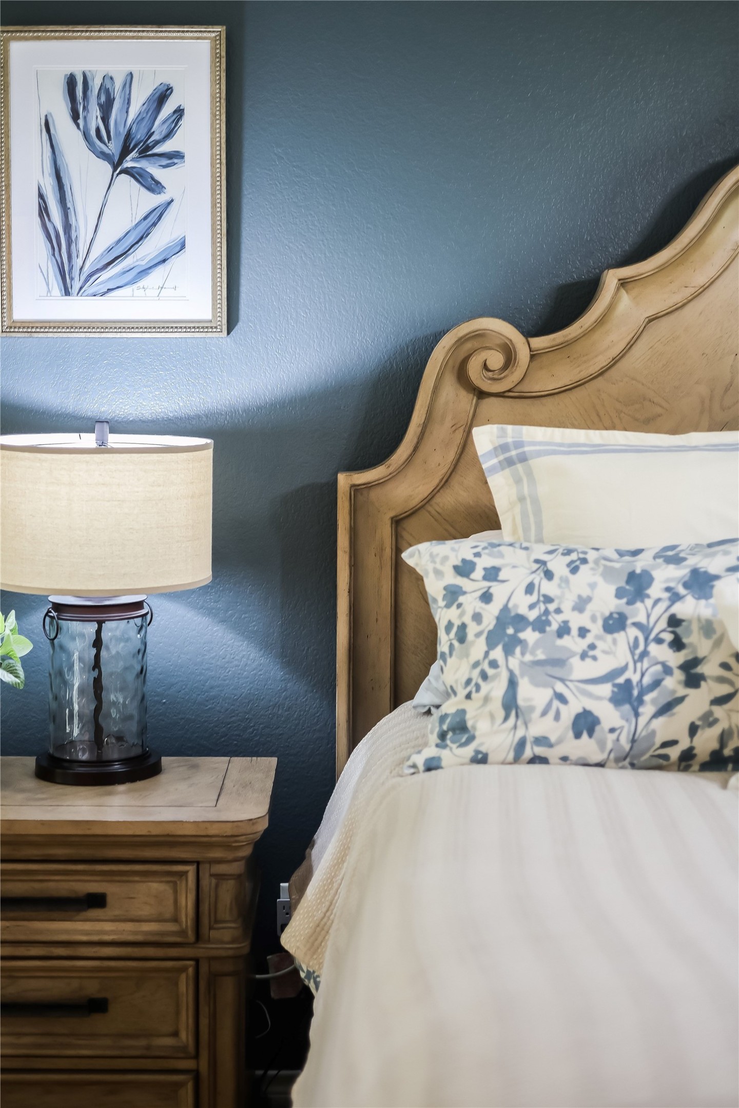 906 Texas Trail Austin, TX 78737 - Photo 16 of 26 a bedroom with a bed and painting on the wall
