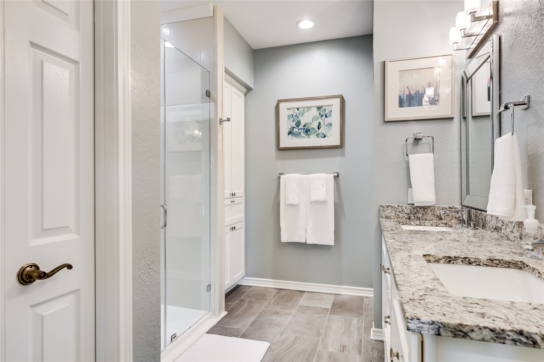 906 Texas Trail Austin, TX 78737 - Photo 17 of 26 a bathroom with a granite countertop shower and a sink