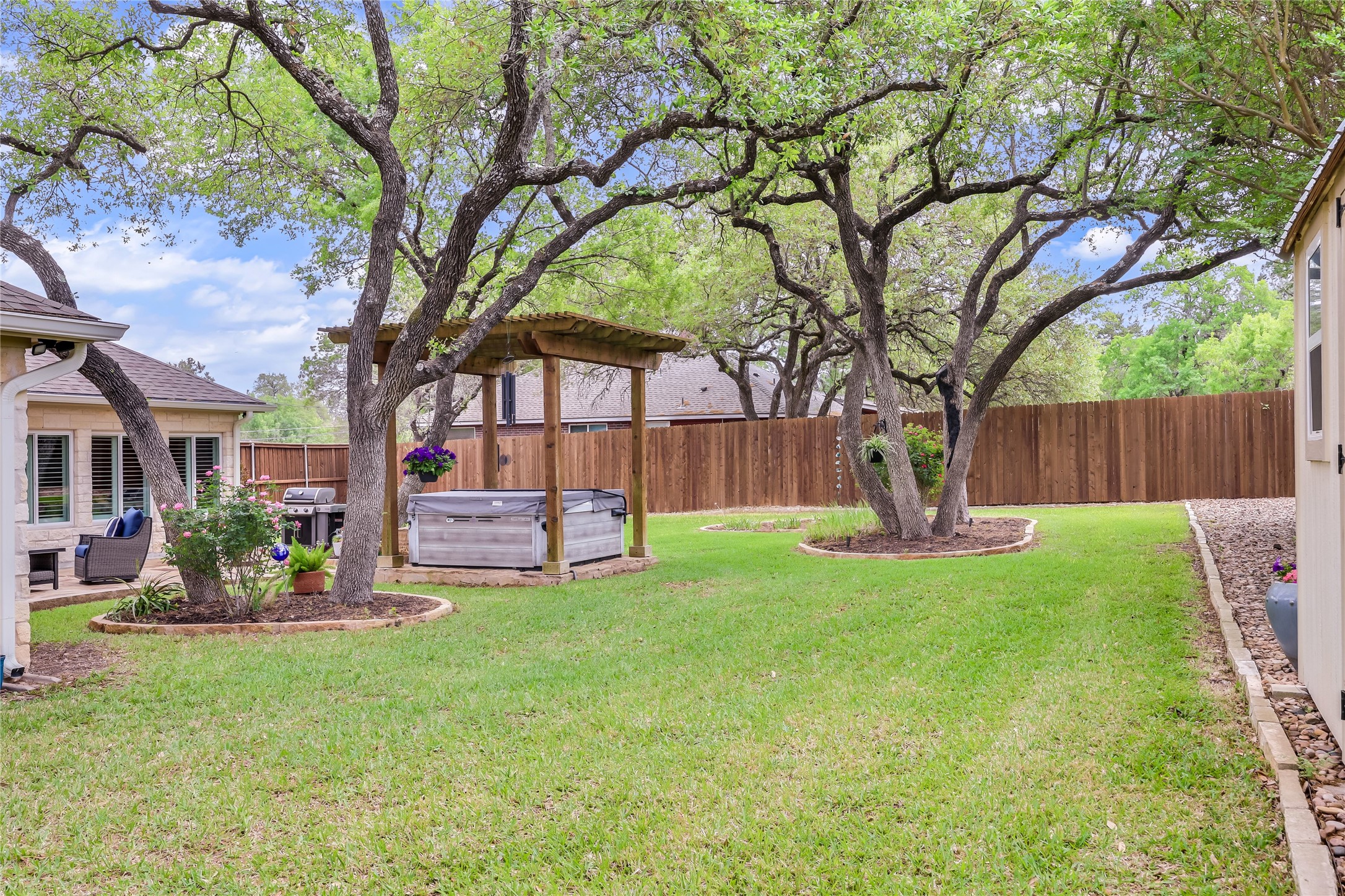 906 Texas Trail Austin, TX 78737 - Photo 21 of 26 a view of a house with a yard