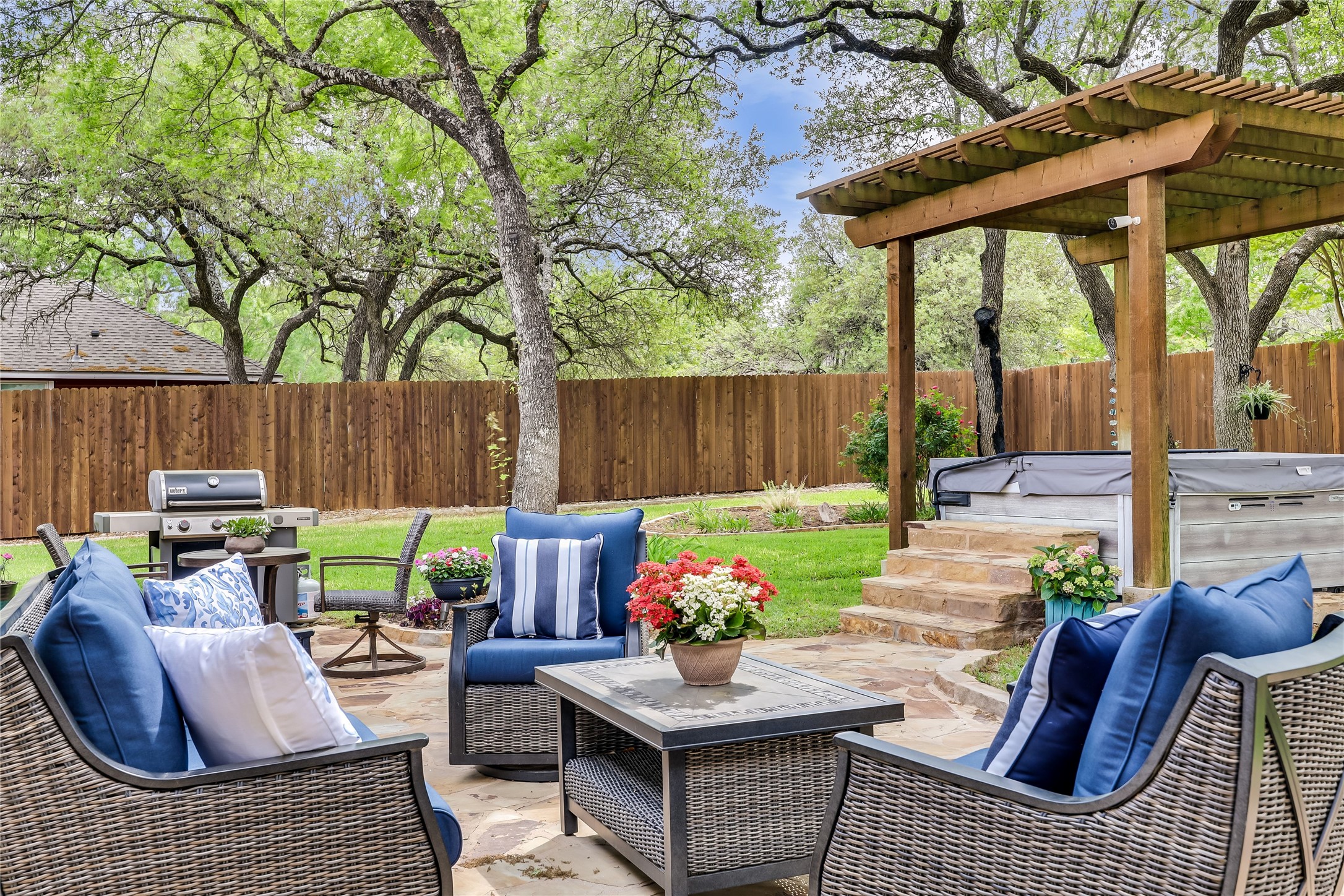 906 Texas Trail Austin, TX 78737 - Photo 23 of 26 a view of backyard of house with seating space