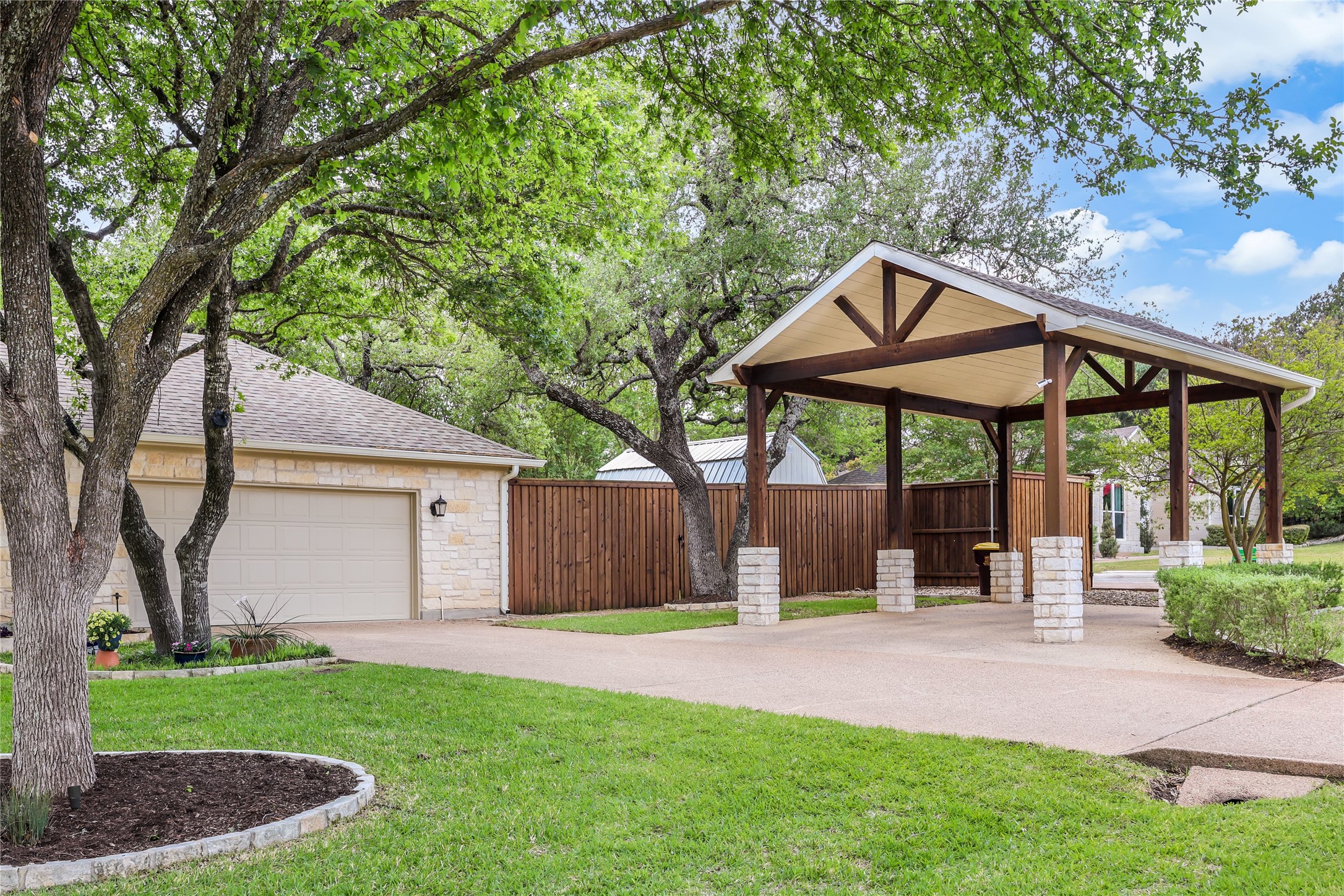 906 Texas Trail Austin, TX 78737 - Photo 25 of 26 a front view of a house with garden